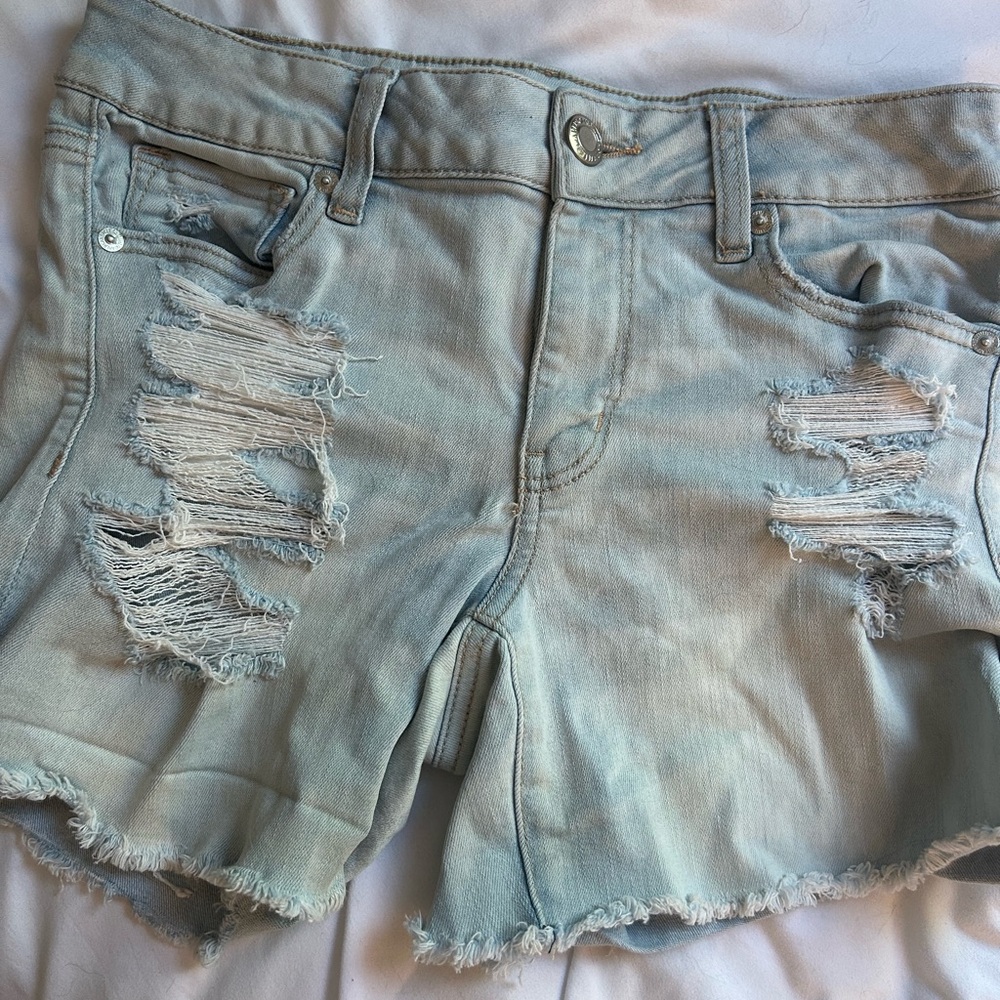 American Eagle light wash distressed denim shorts